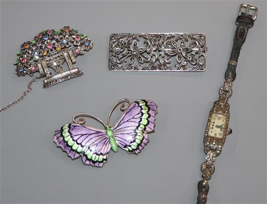 A George V silver and three colour enamel butterfly brooch, a 935 cocktail watch and two marcasite brooches